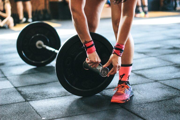 Person Holding Black Barbell_weight lifting for beginners